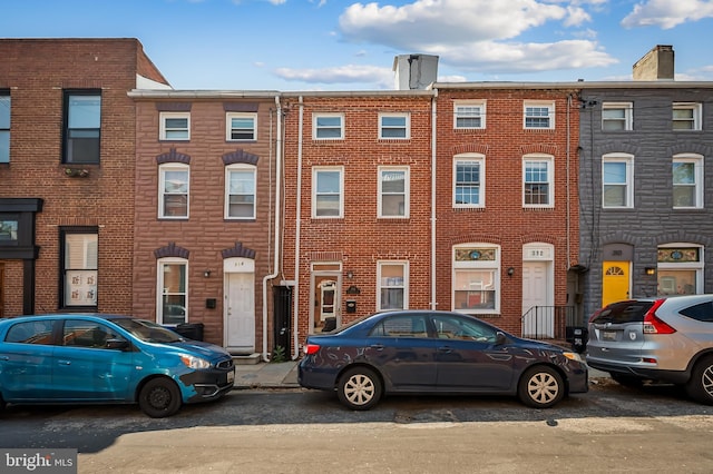 view of front of property with brick siding