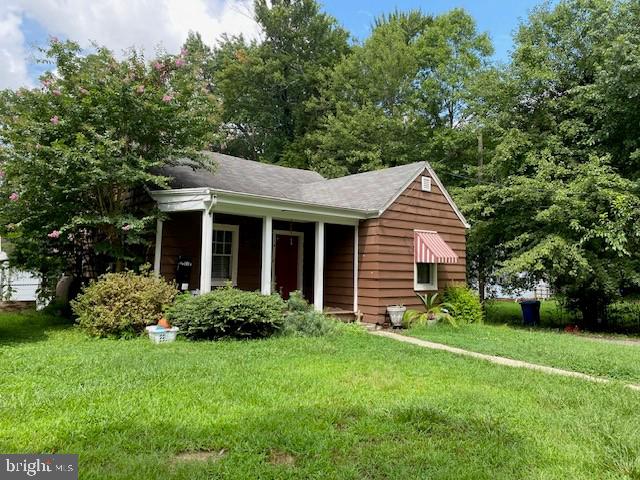 exterior space with a front lawn