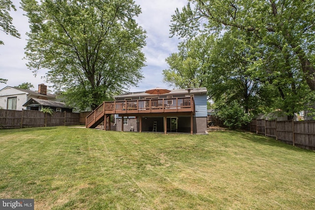 back of property featuring a deck and stairway