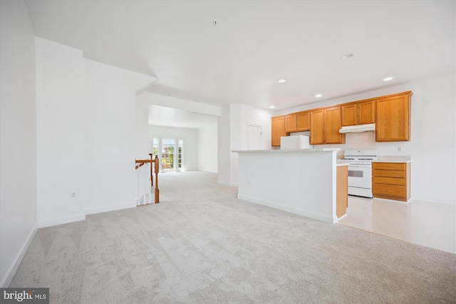 13901 Chatterly Pl, Germantown, MD 20874 - kitchen with white appliances, light colored carpet, light countertops, open floor plan, and recessed lighting
