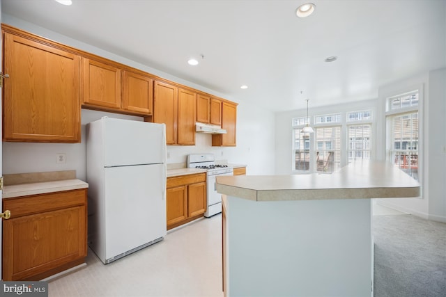 13901 Chatterly Pl, Germantown, MD 20874 - kitchen with white appliances, light countertops, recessed lighting, under cabinet range hood, and brown cabinetry