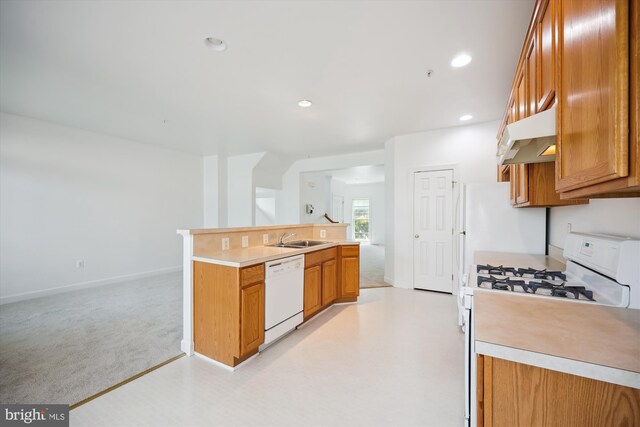 13901 Chatterly Pl, Germantown, MD 20874 - kitchen featuring white appliances, brown cabinets, light countertops, under cabinet range hood, and recessed lighting