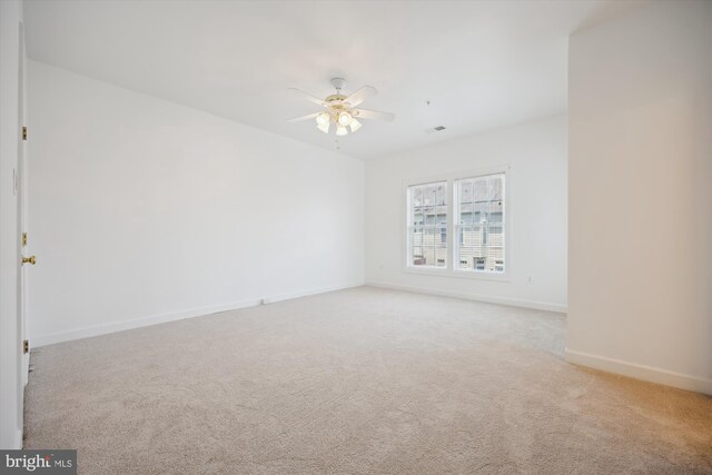 13901 Chatterly Pl, Germantown, MD 20874 - unfurnished room with light colored carpet and ceiling fan