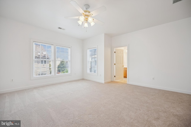 13901 Chatterly Pl, Germantown, MD 20874 - spare room with light colored carpet and a ceiling fan