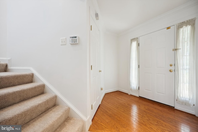 13901 Chatterly Pl, Germantown, MD 20874 - foyer entrance with stairway, light wood-style floors, plenty of natural light, and crown molding