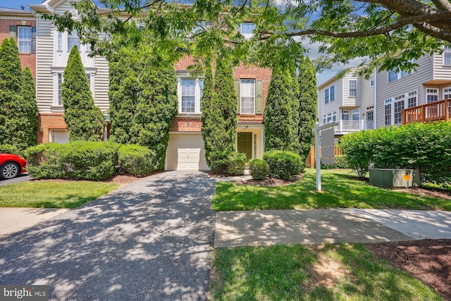 13901 Chatterly Pl, Germantown, MD 20874 - townhome / multi-family property featuring brick siding, concrete driveway, and an attached garage