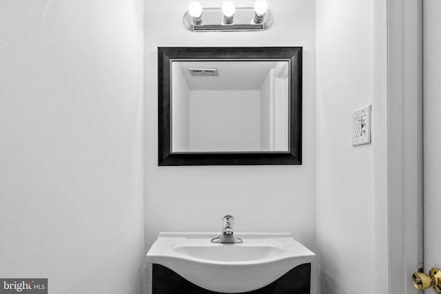 bathroom with visible vents and vanity