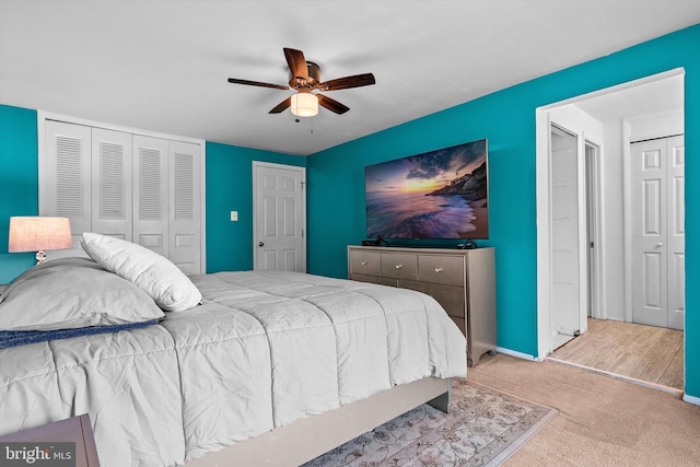 bedroom with carpet flooring, a ceiling fan, and baseboards