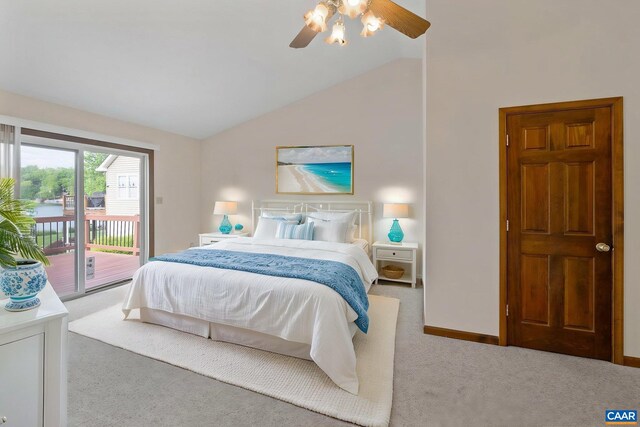 carpeted bedroom with a ceiling fan, baseboards, vaulted ceiling, and access to exterior