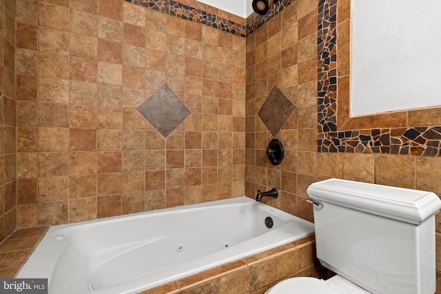 full bathroom featuring toilet and tile walls