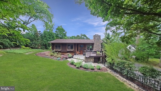 view of front of property featuring a chimney