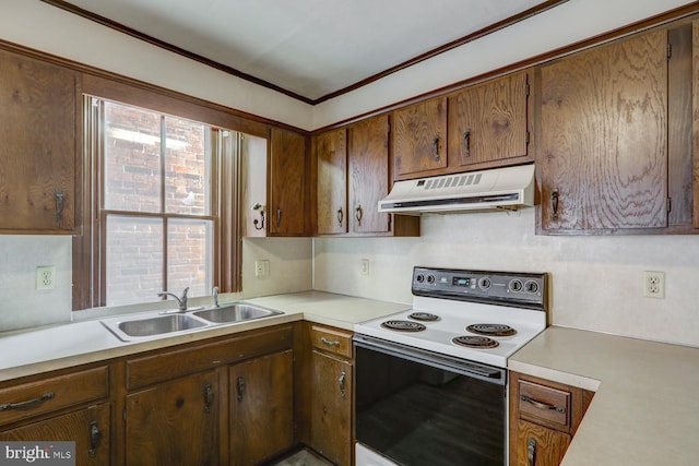 kitchen with a sink, under cabinet range hood, range with electric cooktop, and light countertops