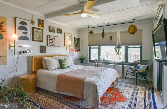 3801 Atlantic Ave Unit 105, Ocean City, MD 21842 - bedroom with crown molding and wood finished floors