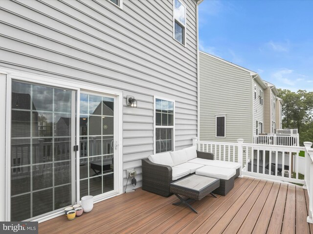 deck with an outdoor living space