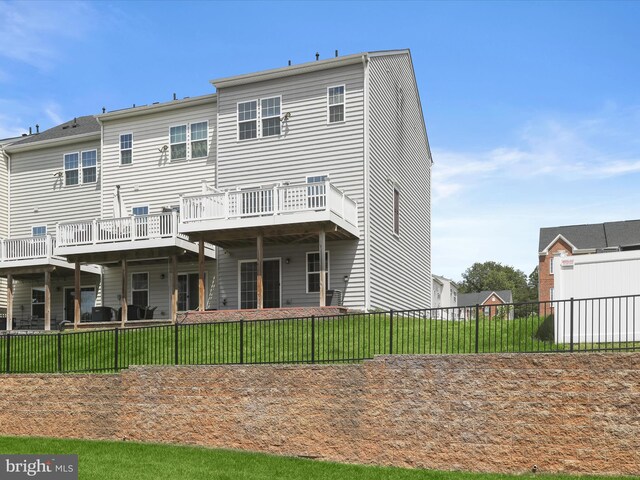 rear view of property with a deck