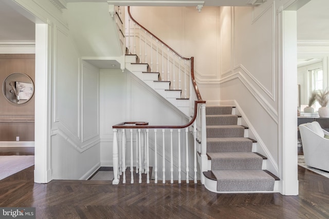 stairs with a decorative wall