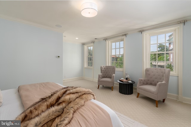 bedroom featuring baseboards, ornamental molding, recessed lighting, and light colored carpet
