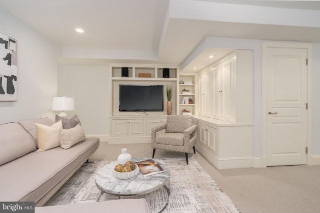 carpeted living area featuring recessed lighting