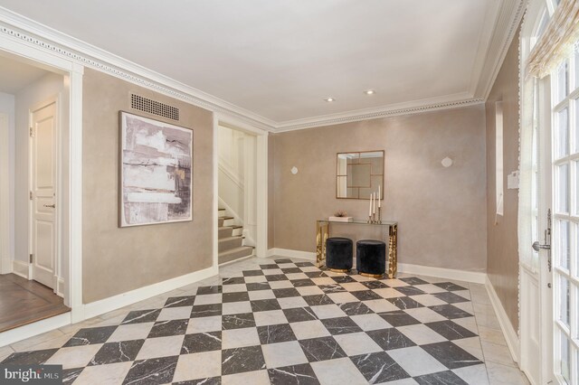 unfurnished living room with stairs, baseboards, visible vents, and ornamental molding