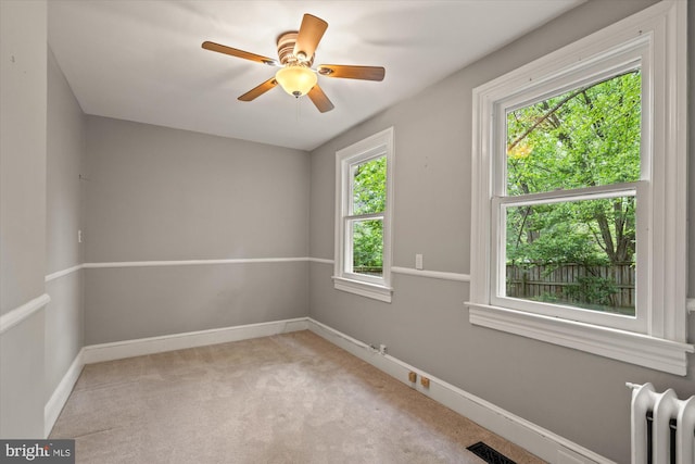 6763 25th St N, Arlington, VA 22213 - carpeted empty room with radiator, baseboards, and ceiling fan