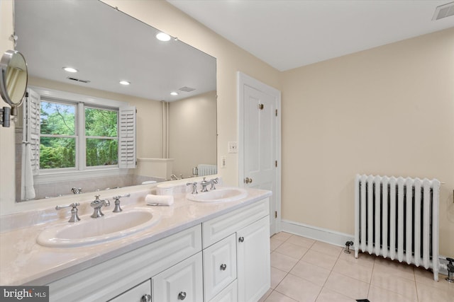 6763 25th St N, Arlington, VA 22213 - full bathroom featuring radiator, tile patterned floors, double vanity, baseboards, and recessed lighting