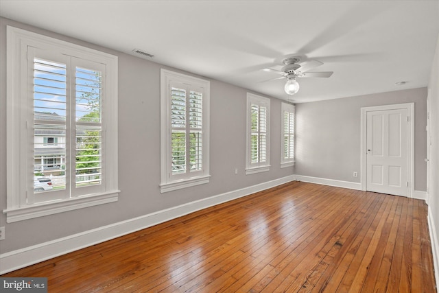 6763 25th St N, Arlington, VA 22213 - unfurnished room featuring baseboards, wood-type flooring, and plenty of natural light