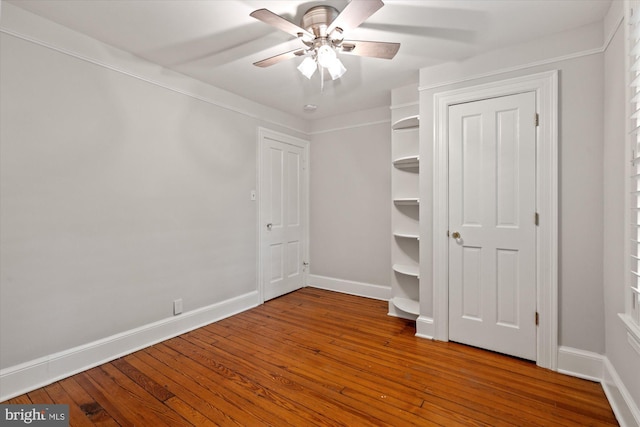 6763 25th St N, Arlington, VA 22213 - unfurnished bedroom featuring baseboards, hardwood / wood-style flooring, and ceiling fan