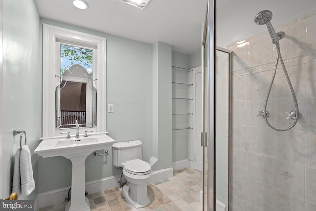 6763 25th St N, Arlington, VA 22213 - bathroom with a shower stall, baseboards, toilet, tile patterned flooring, and recessed lighting