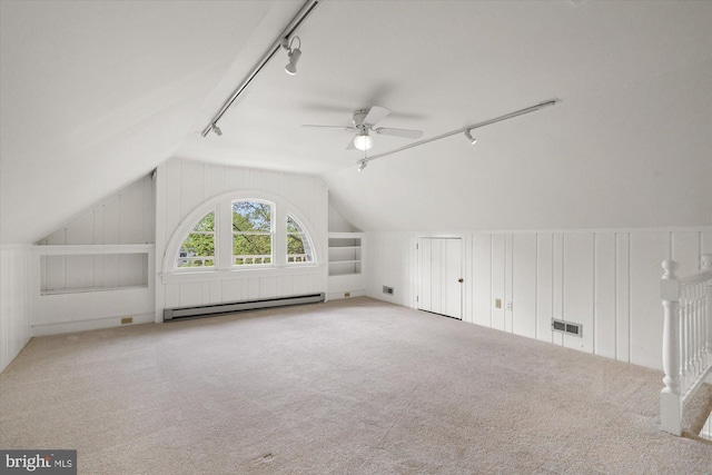 6763 25th St N, Arlington, VA 22213 - additional living space with baseboard heating, vaulted ceiling, a decorative wall, a ceiling fan, and carpet