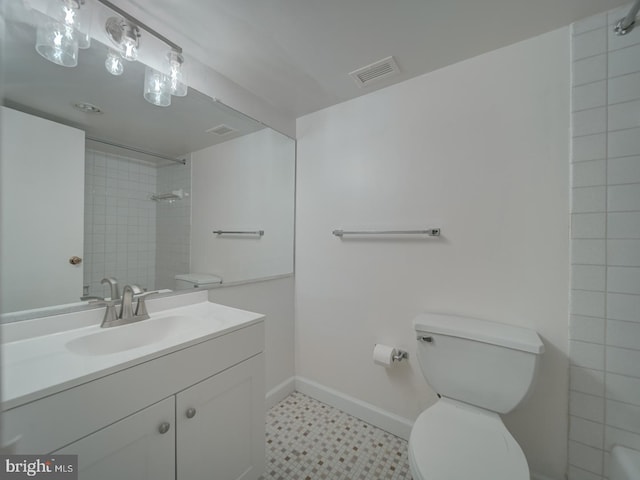 full bathroom featuring visible vents, a shower, toilet, baseboards, and tile patterned floors