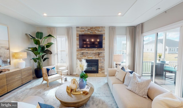 33833 Joel Ln, Lewes, DE 19958 - living room with recessed lighting, plenty of natural light, and a fireplace