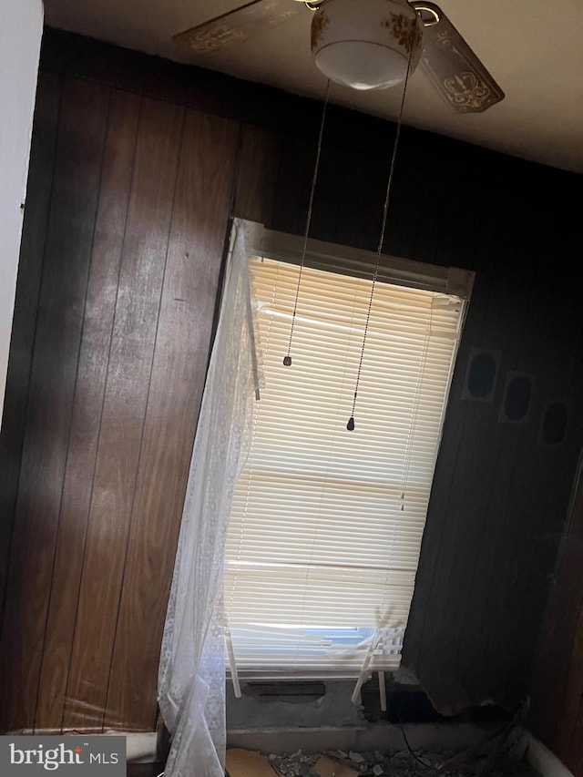 details featuring wood walls