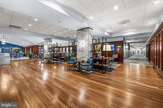 1000 Fell St Unit 633, Baltimore, MD 21231 - workout area with a paneled ceiling and wood-type flooring