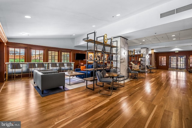 1000 Fell St Unit 633, Baltimore, MD 21231 - living room featuring hardwood / wood-style floors, vaulted ceiling, and recessed lighting