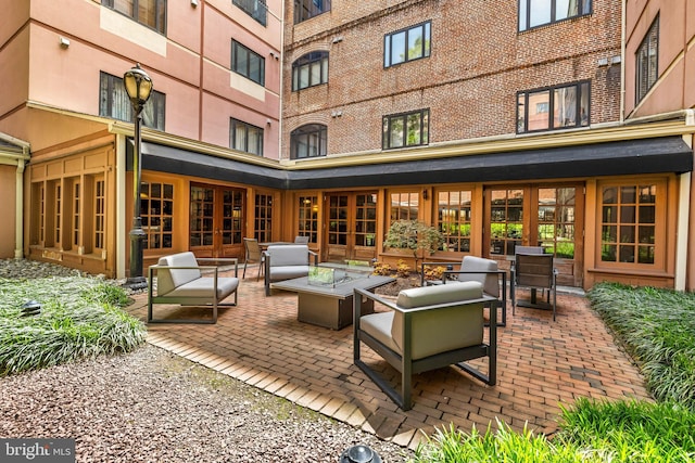 1000 Fell St Unit 633, Baltimore, MD 21231 - view of patio / terrace featuring an outdoor hangout area and french doors