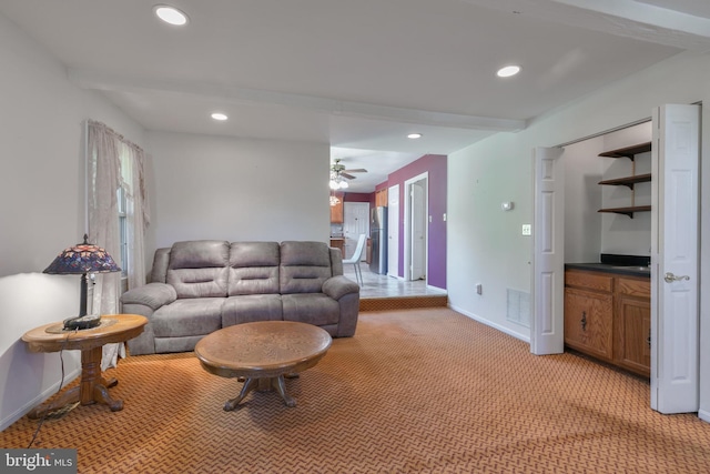 living room featuring visible vents, light carpet, baseboards, ceiling fan, and recessed lighting