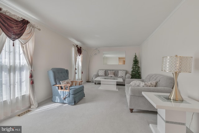living room featuring crown molding, visible vents, and light carpet