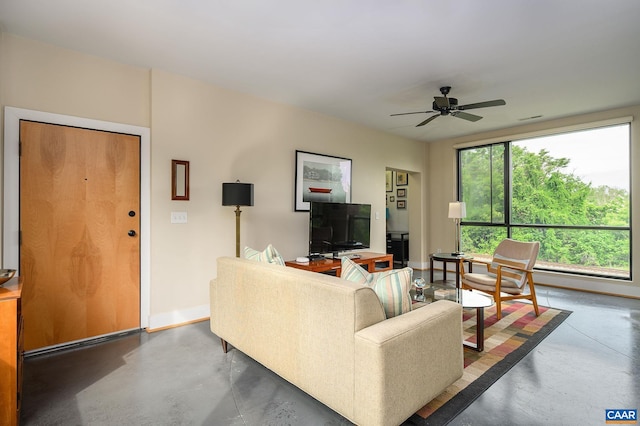 211 Cream St Unit 202, Charlottesville, VA 22903 - living area featuring concrete floors, baseboards, and a ceiling fan