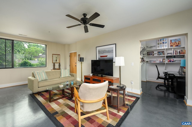 211 Cream St Unit 202, Charlottesville, VA 22903 - living room featuring finished concrete flooring, an office area, ceiling fan, and baseboards