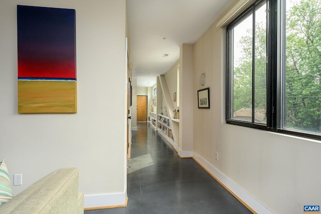 211 Cream St Unit 202, Charlottesville, VA 22903 - hallway with baseboards and finished concrete floors