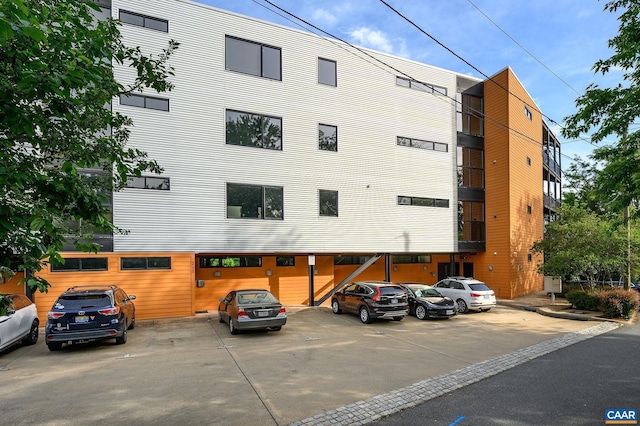 211 Cream St Unit 202, Charlottesville, VA 22903 - view of building exterior featuring uncovered parking