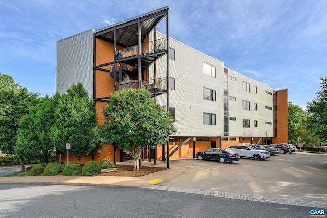 211 Cream St Unit 202, Charlottesville, VA 22903 - view of property with uncovered parking and stairway