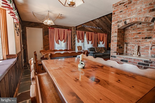 dining area with wood walls