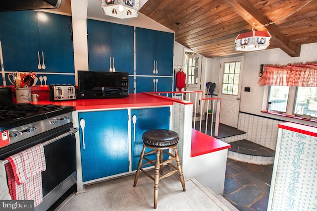 kitchen with wood ceiling, blue cabinets, black microwave, stainless steel gas range, and vaulted ceiling with beams