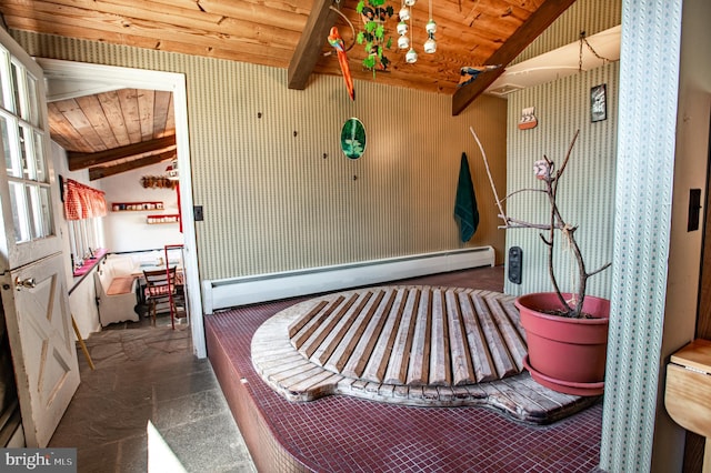 misc room featuring wood ceiling, a baseboard heating unit, and lofted ceiling