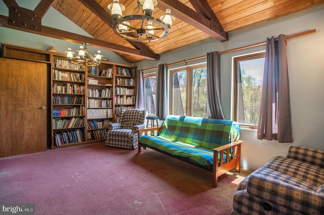 living area featuring lofted ceiling with beams, a notable chandelier, wooden ceiling, and plenty of natural light