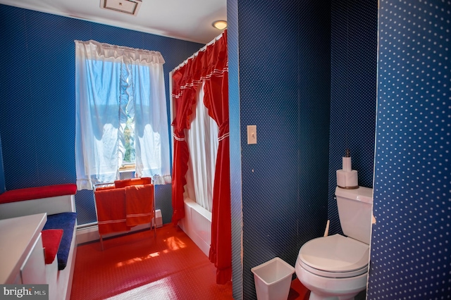 full bath with toilet, baseboard heating, and vanity