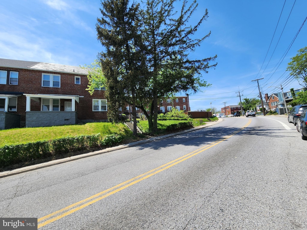view of street with curbs and sidewalks