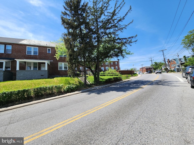 view of street with curbs and sidewalks