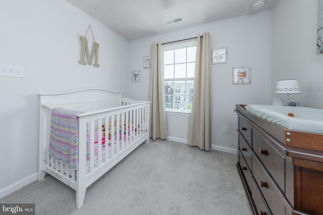504 Sammy St, Woolwich Twp, NJ 08085 - carpeted bedroom featuring a crib, baseboards, and visible vents